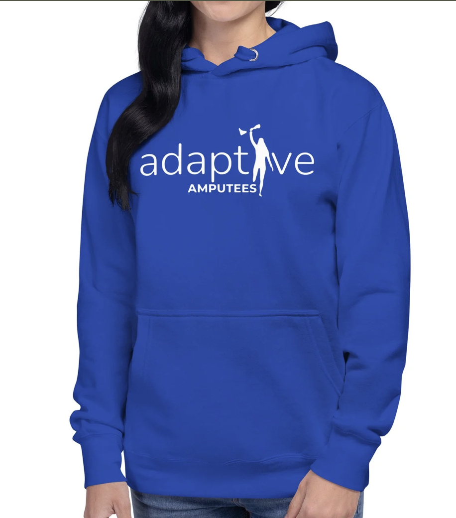 Woman wears electric blue hoodie with adaptive amputees logo